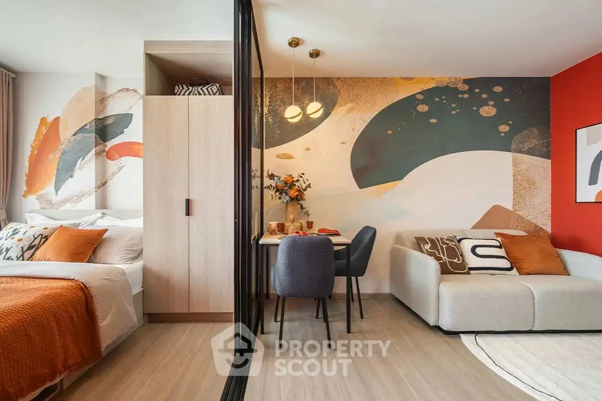 Modern studio apartment with stylish decor and cozy living area.