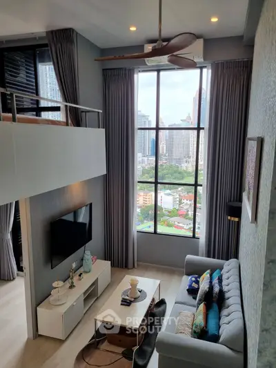 Modern living room with high ceiling and city view from large window