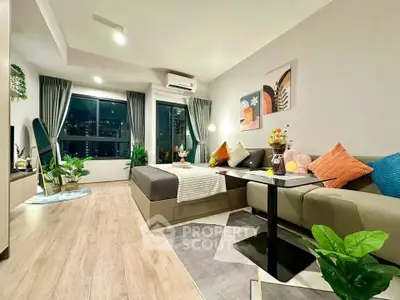 Stylish modern living room with cozy seating and city view, perfect for urban living.