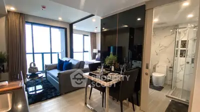 Modern open-plan living room with dining area and stylish decor