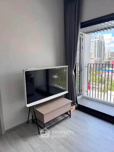 Modern living room with balcony view in urban apartment
