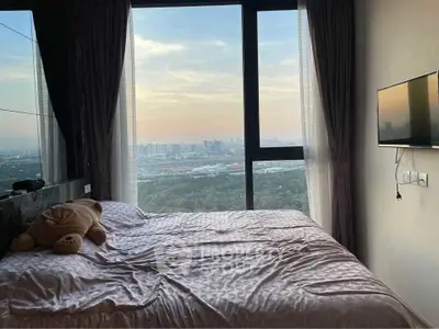 Luxurious bedroom with panoramic city view and modern decor