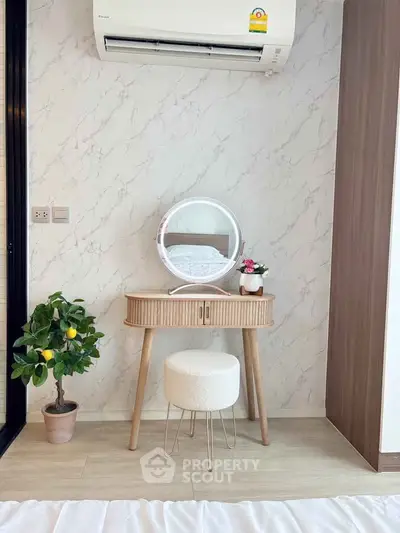 Stylish bedroom corner with modern vanity and air conditioning