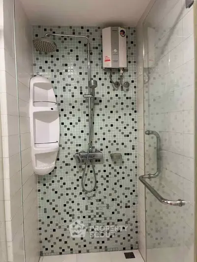 Modern bathroom with mosaic tiles and shower heater