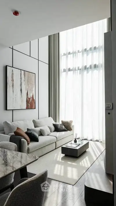 Luxurious modern living room with high ceilings and elegant decor