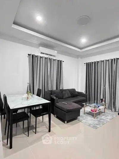 Modern living room with sleek furniture and elegant decor