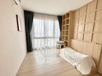 Minimalist bedroom with floor-to-ceiling windows and wooden shelving