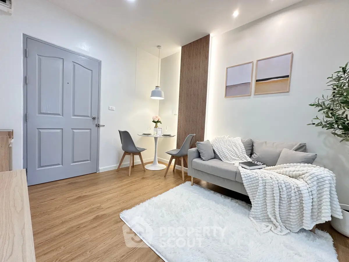 Cozy modern living room with stylish decor and wooden flooring