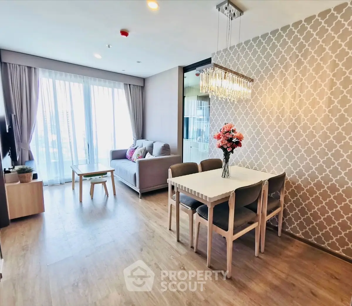 Modern living room with elegant dining area and stylish decor