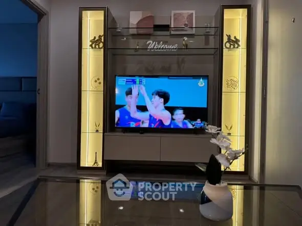 Modern living room with stylish TV unit and ambient lighting