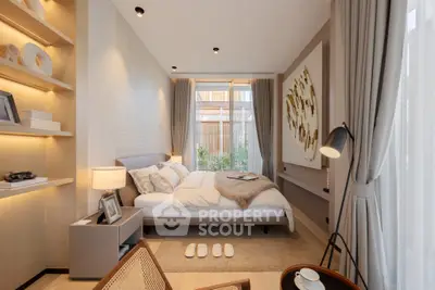 Luxurious bedroom with modern decor and large window view