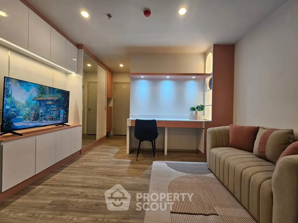 Modern living room with sleek design and cozy seating area