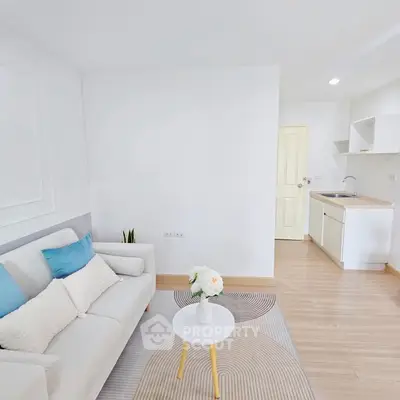 Bright and modern living room with cozy sofa and stylish decor