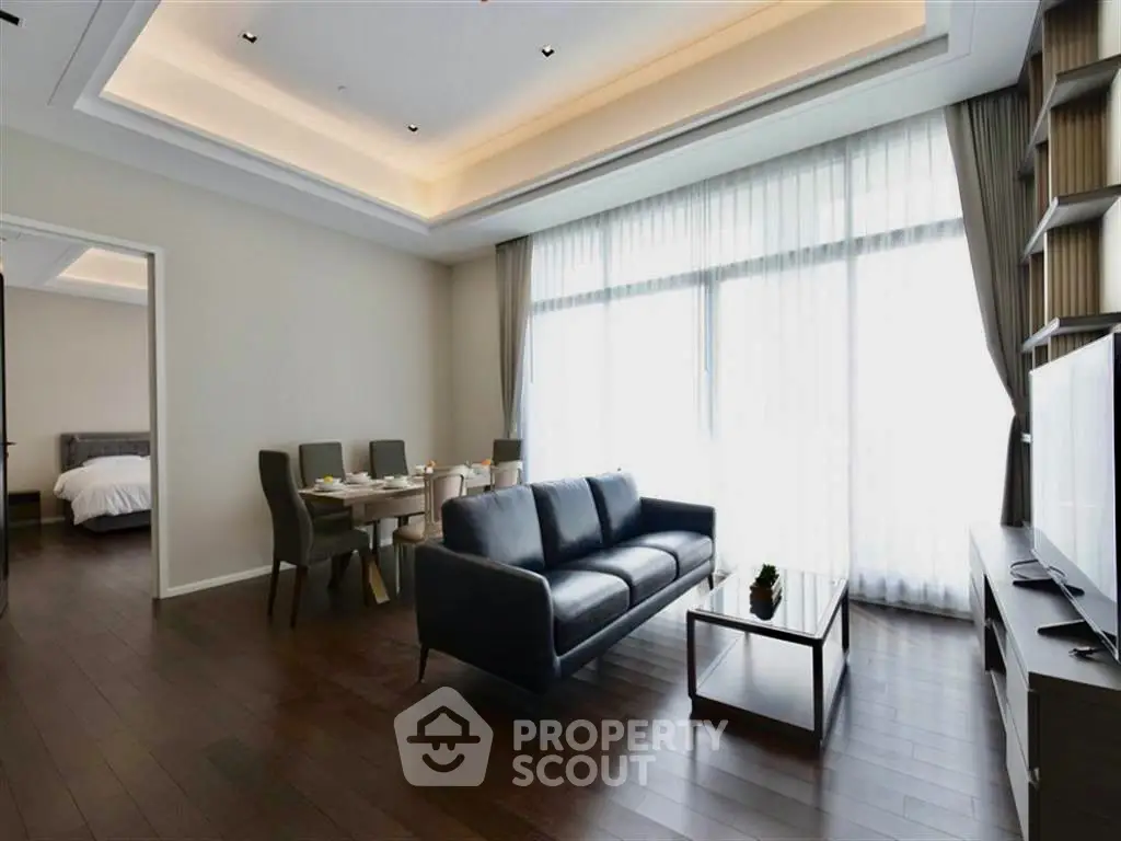 Spacious modern living room with elegant decor and natural light