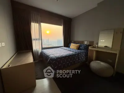 Cozy bedroom with sunset view, modern decor, and stylish furnishings.