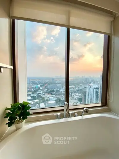 Luxurious bathroom with stunning city view from large window, featuring elegant bathtub and serene ambiance.