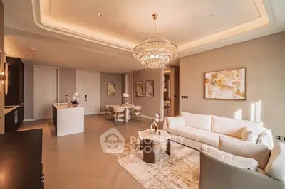 Luxurious living room with elegant chandelier and modern decor in upscale apartment