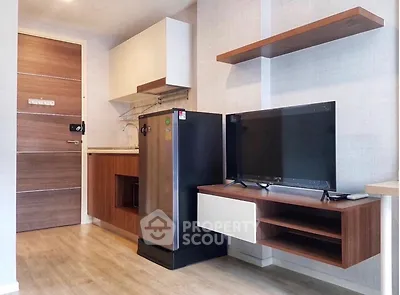 Modern compact kitchen with sleek appliances and stylish wooden accents