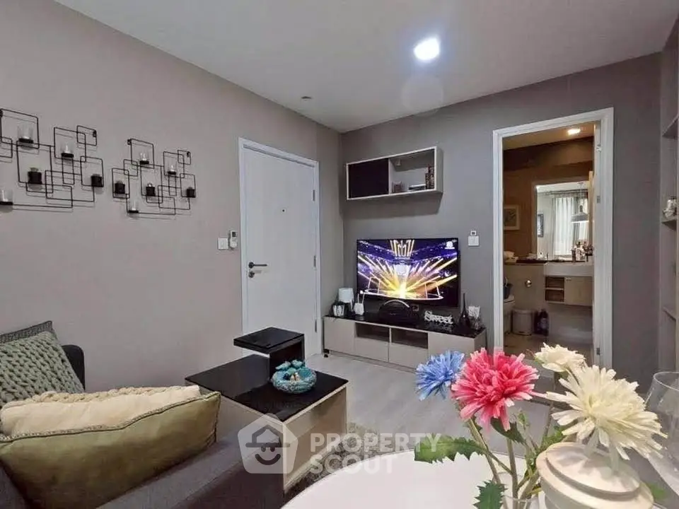 Cozy living room with modern decor and entertainment setup