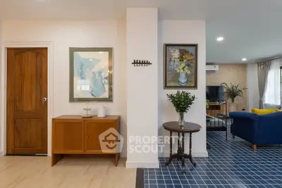 Charming living room with stylish decor and blue tiled floor