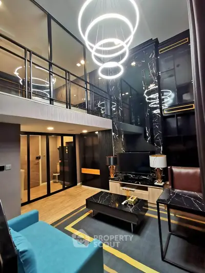 Luxurious modern living room with high ceilings and elegant lighting in a stylish apartment.