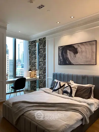 Luxurious bedroom with city view, modern decor, and stylish furnishings in a high-rise apartment.