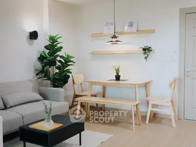 Modern living room with stylish dining area and indoor plants