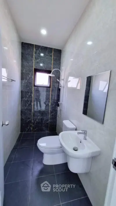 Modern bathroom with sleek fixtures and elegant tile design