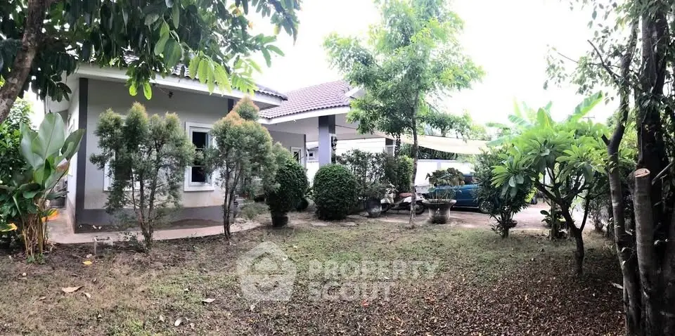 Charming suburban home with lush garden and spacious yard, perfect for family living.