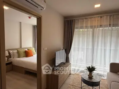 Modern living room with balcony view and cozy bedroom in stylish apartment