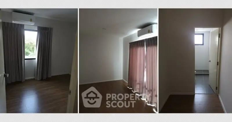 Spacious rooms with wooden flooring and large windows in a modern apartment.