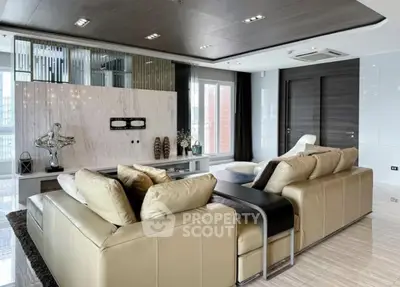 Luxurious modern living room with elegant decor and spacious seating area