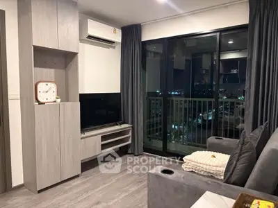 Modern living room with sleek furniture and city view balcony, perfect for urban living.