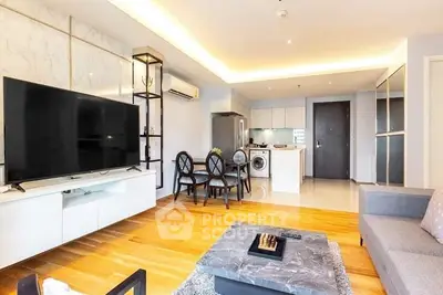 Spacious modern living room with open kitchen and stylish decor