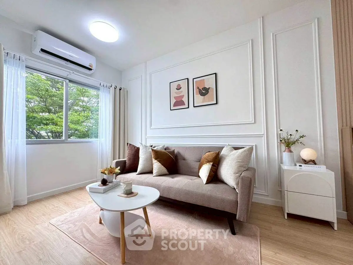 Chic and cozy living room with modern decor and natural light