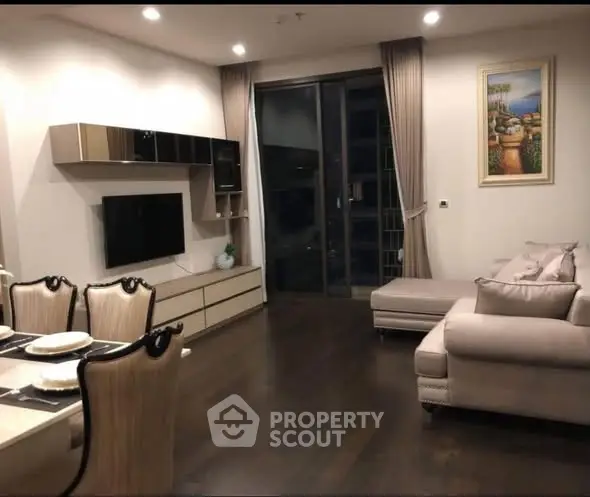 Elegant living room with modern decor and cozy seating area