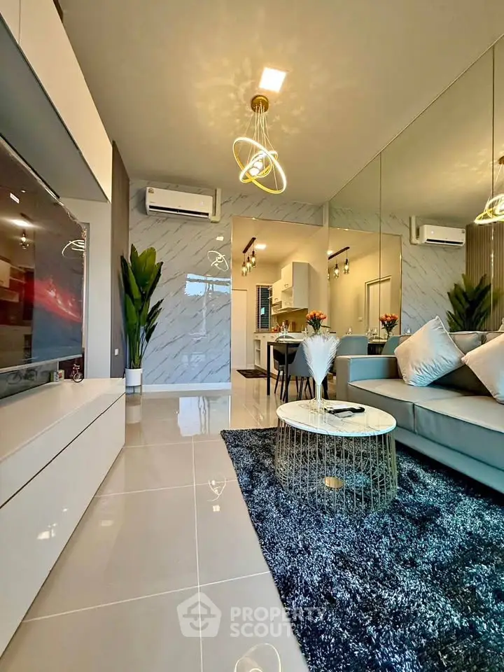 Modern living room with stylish decor and open kitchen layout