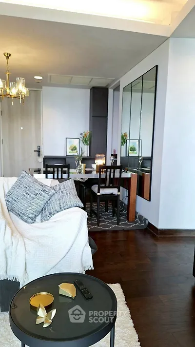 Stylish living room with modern decor and elegant dining area