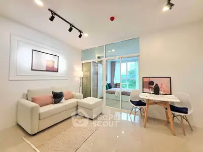 Modern living room with cozy sofa and dining area in stylish apartment