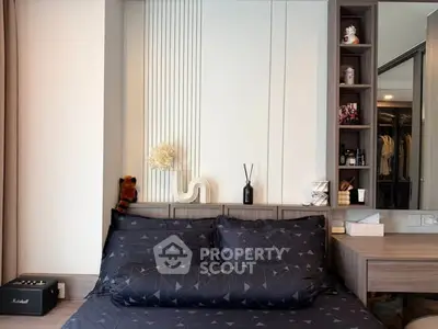 Modern bedroom with stylish decor and built-in storage solutions