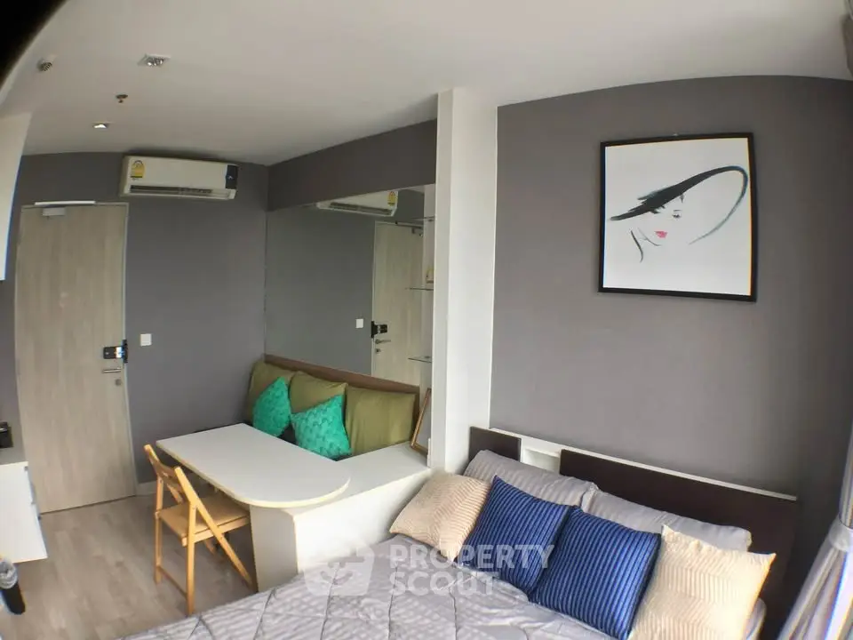 Modern studio apartment with stylish decor and cozy furnishings