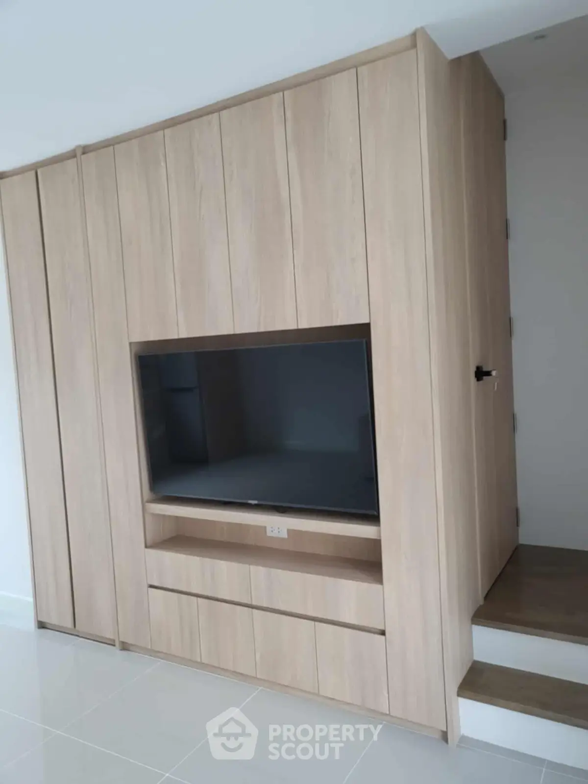 Modern built-in wooden entertainment unit with sleek design