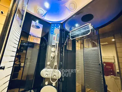 Luxurious modern shower cabin with sleek design and advanced features in a contemporary bathroom.