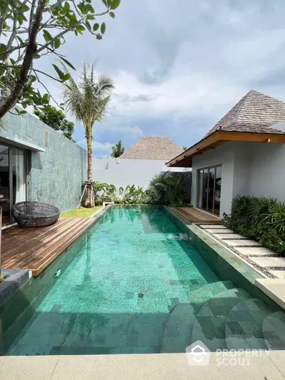 Luxurious villa with private pool and tropical garden oasis