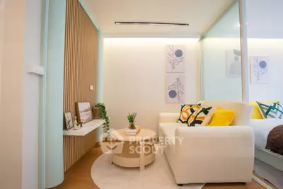 Chic modern living room with cozy sofa and stylish decor in a bright apartment.
