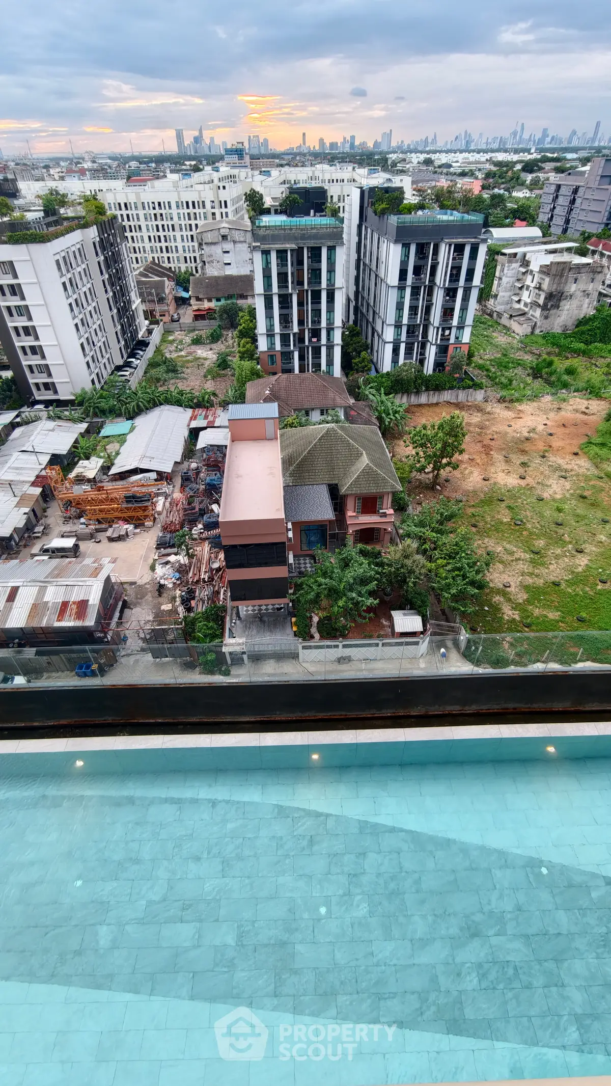 Stunning rooftop pool with panoramic city view, perfect for luxury urban living.