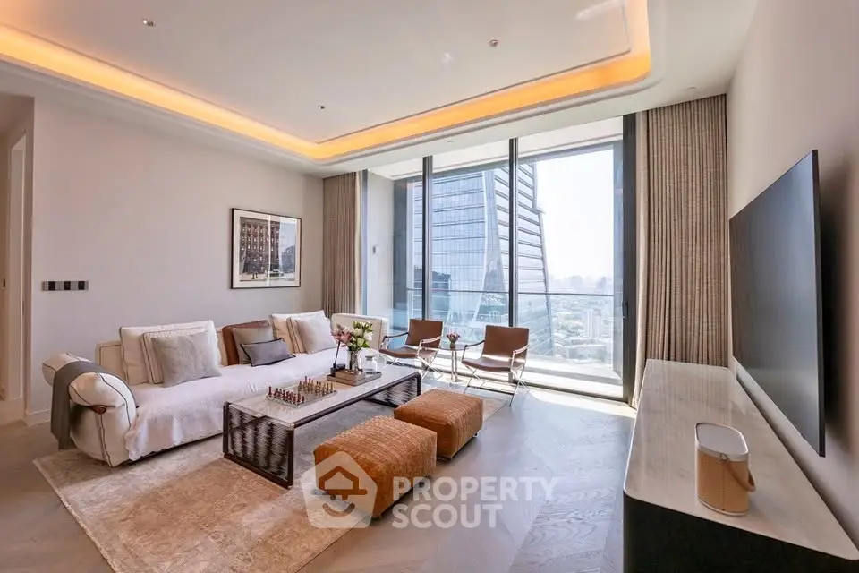 Luxurious modern living room with floor-to-ceiling windows and stunning city view.