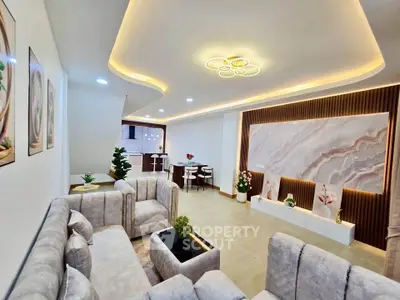Luxurious modern living room with elegant lighting and plush seating