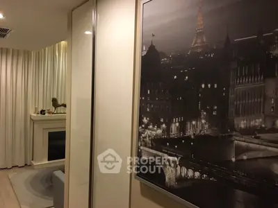 Stylish living room with elegant decor and Paris-themed artwork