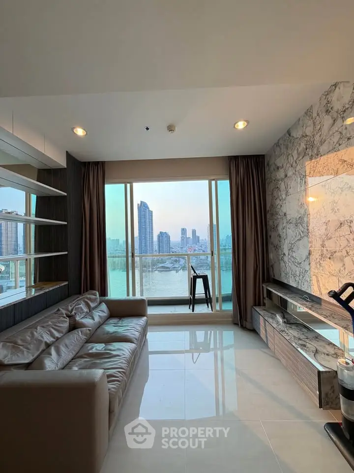 Luxurious living room with stunning city view, modern decor, and elegant marble accents.